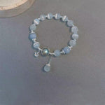 Bracelet imitation œil de chat cristal de papillon