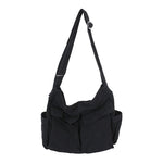 Sac messager en toile de couleur unie