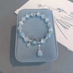 Bracelet imitation œil de chat cristal de papillon