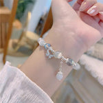 Bracelet imitation œil de chat cristal de papillon