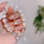 Bracelet imitation œil de chat cristal de papillon