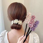 Fleur Cheveux Coiler