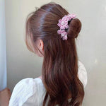 Fleur Cheveux Coiler