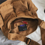 Sac messager en toile de couleur unie