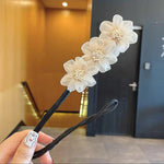 Fleur Cheveux Coiler