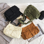 Sac messager en toile de couleur unie