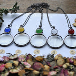 Collier pendentif grande loupe